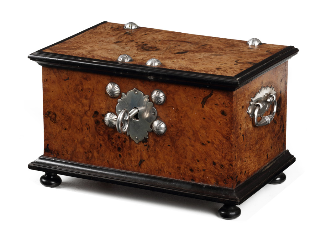 A fine Indonesian Amboyna burl, ebony and teak casket with silver mounts