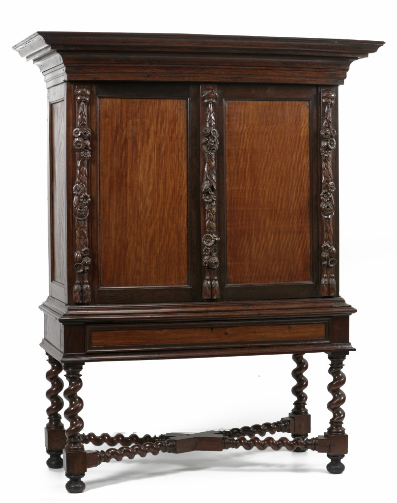 A remarkable Indonesian amboyna, padouk, meranti and djati wood cabinet on stand