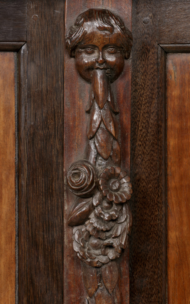 A remarkable Indonesian amboyna, padouk, meranti and djati wood cabinet on stand
