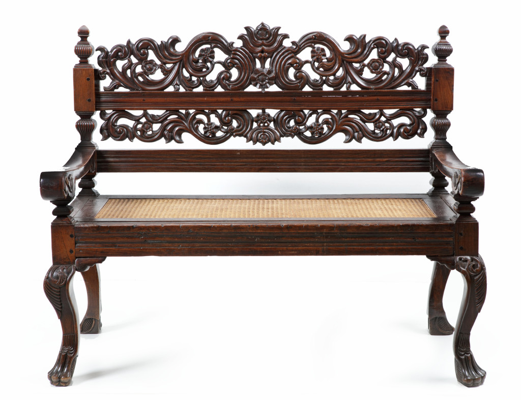 A fine small Indonesian, possibly Ambonese, Djati wood bench