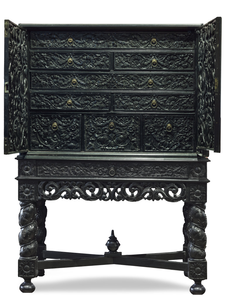 An important Indonesian ebony and ebonized cabinet on stand