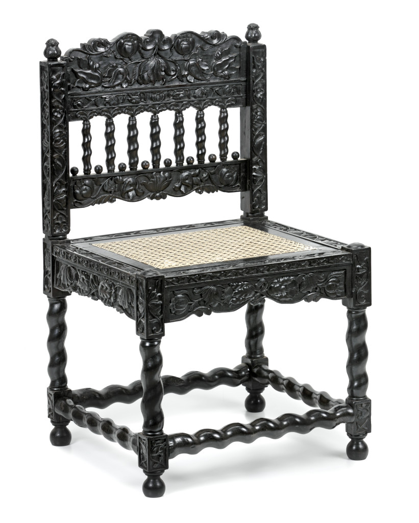 A fine Indonesian ebony low chair