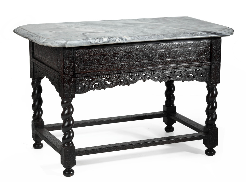 An Indonesian ebony centre table with marble top