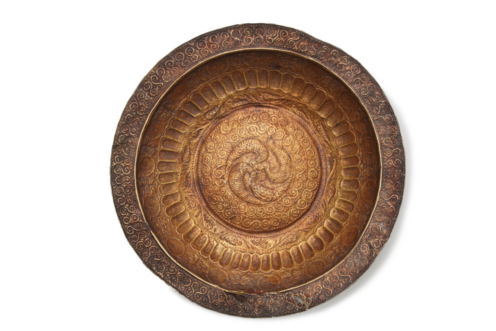 Three Indonesian gold repoussé dishes