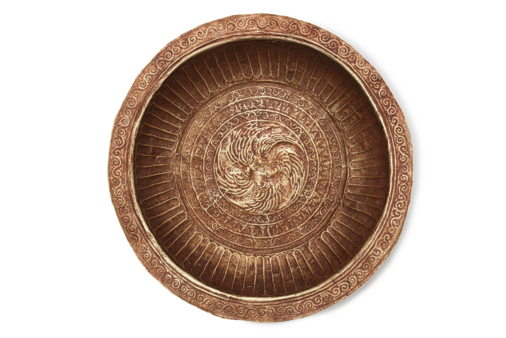 Three Indonesian gold repoussé dishes