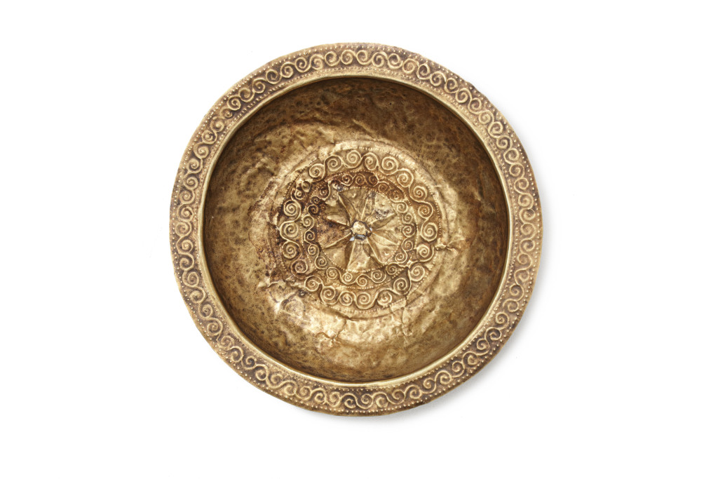 Three Indonesian gold repoussé dishes