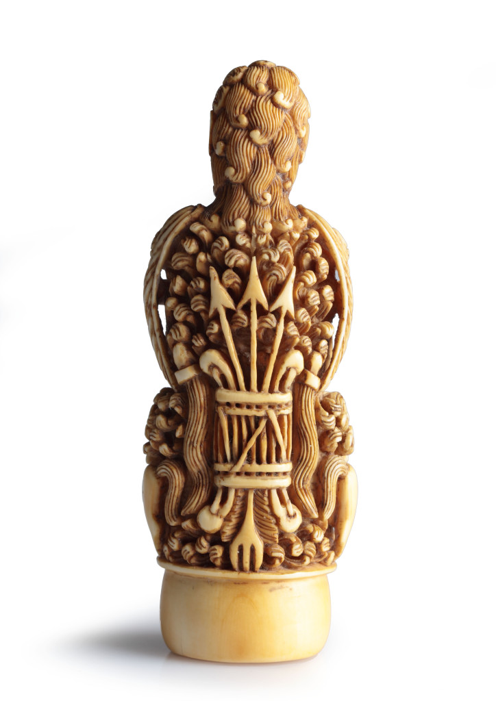 An Indonesian carved ivory keris hilt