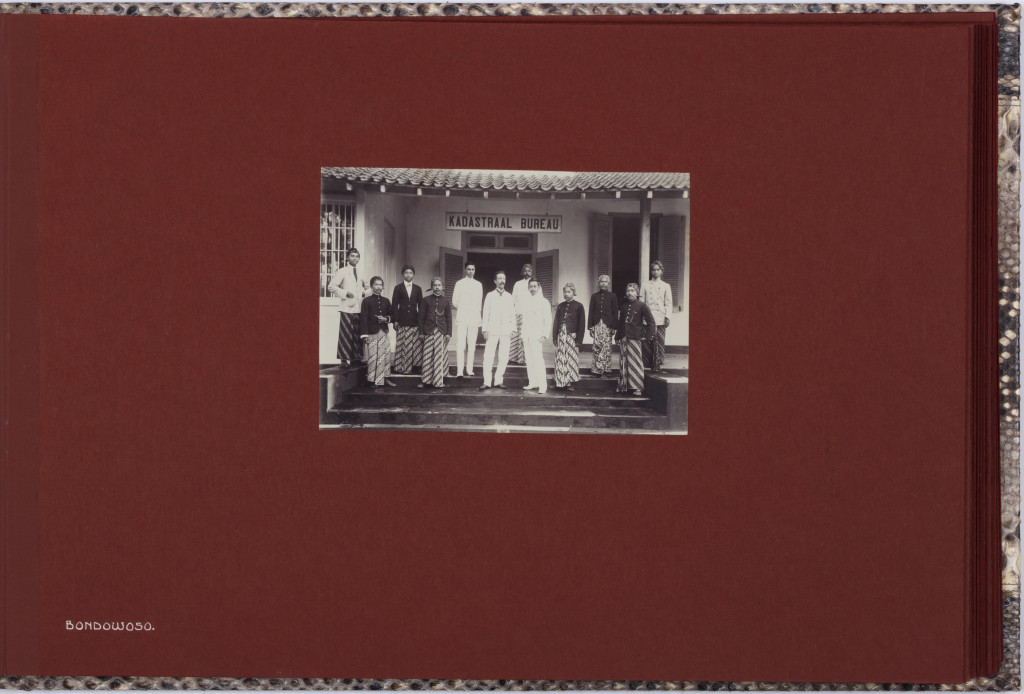 An important commemorating Indonesian carved Sawo wood box containing a luxurious photo album