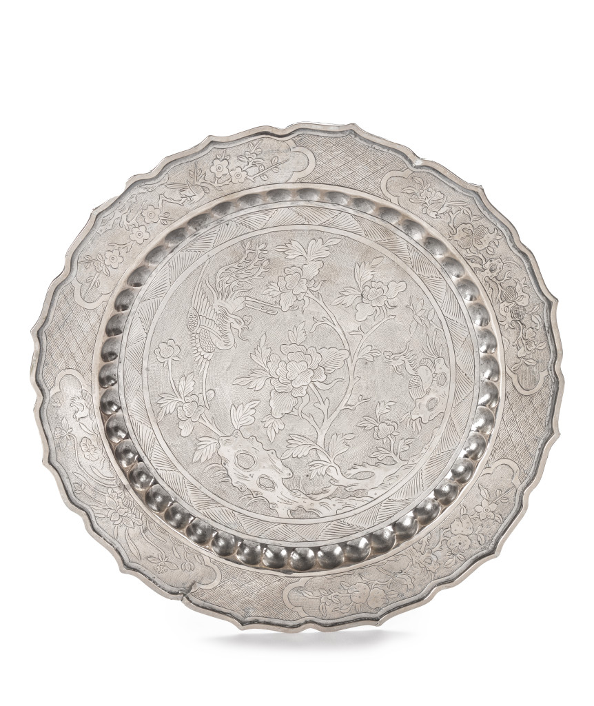 A silver Indonesian Peranakan plate