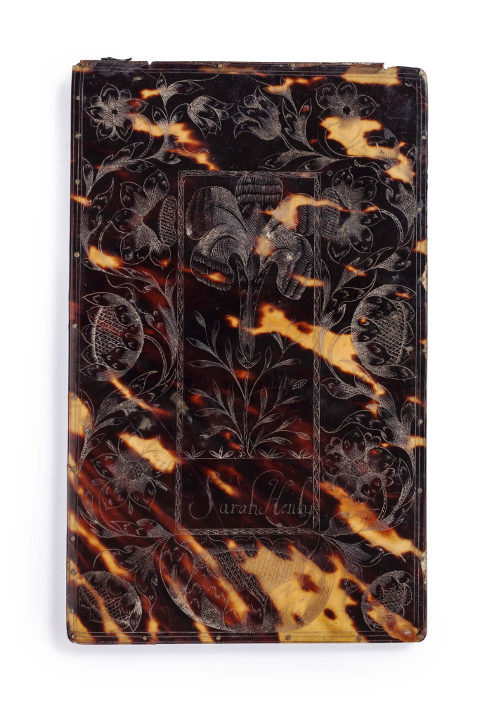 A Jamaican colonial engraved tortoiseshell comb-case with two combs