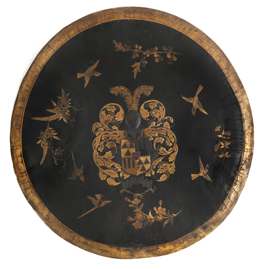 A highly important Japanese export lacquer Indian buffalo shield with the Sweers coat-of-arms, for the Dutch market