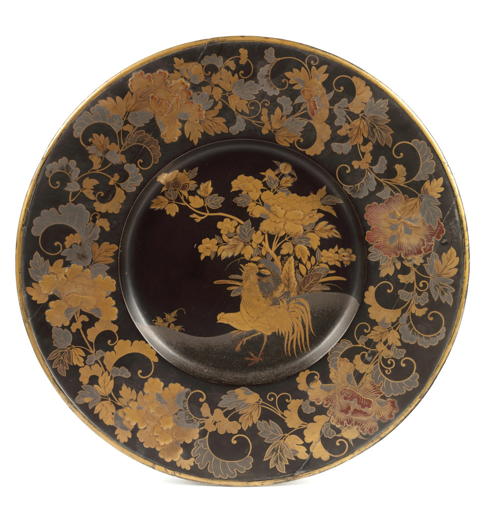 A fine Japanese export black and gold lacquered Pictorial-style dish
