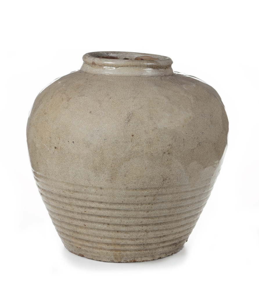 A Korean ribbed stoneware storage jar