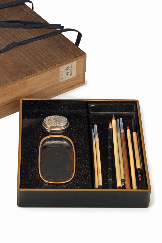A Japanese wood and lacquer Suzuribako writing box and cover signed Koma Kansai
