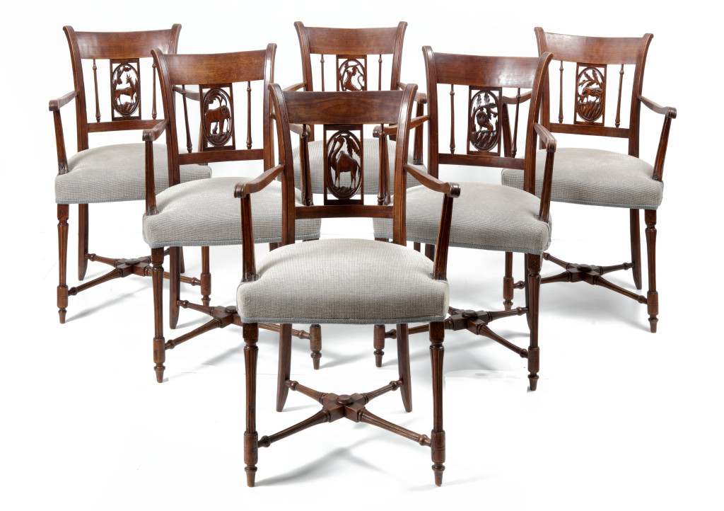 A set of six French directoire chairs with figural back splats depicting African animals