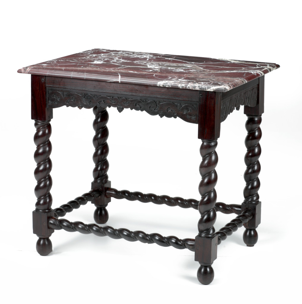 A Moluccan red ebony centre table with marble top