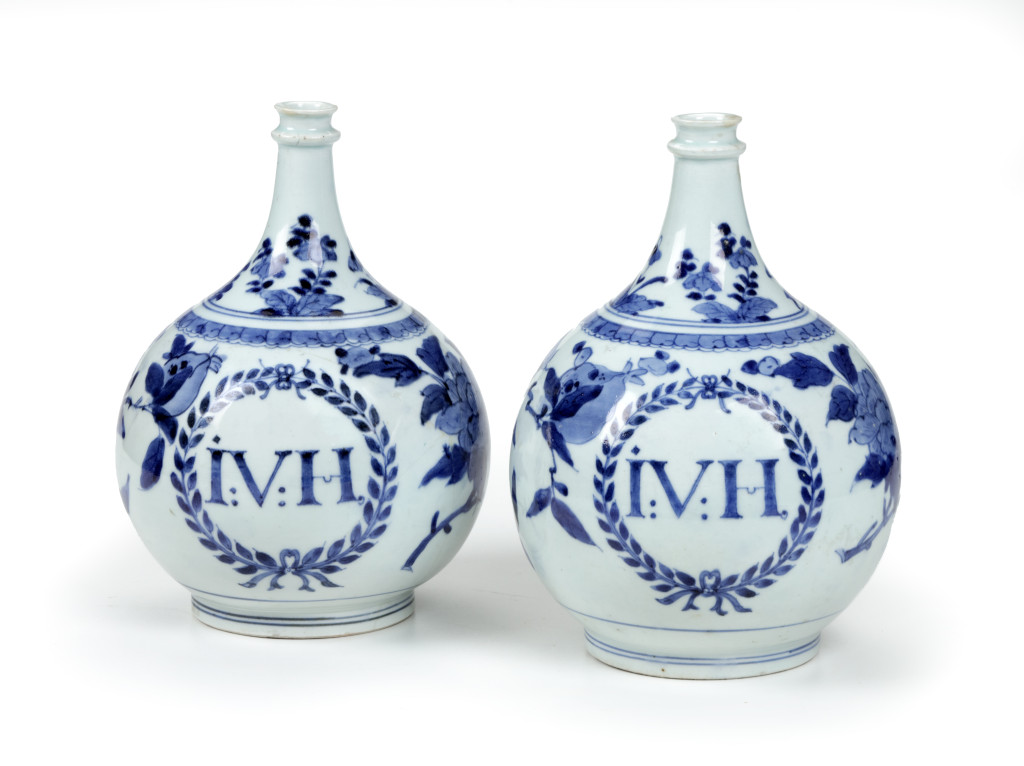 A pair of Japanese blue and white Arita porcelain bottles with the initials of Governor-General Joan van Hoorn of the former Dutch-Indies
