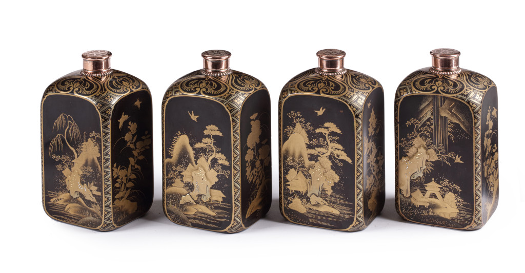 A set of four extremely rare and important pictorial-style Japanese export lacquer bottles