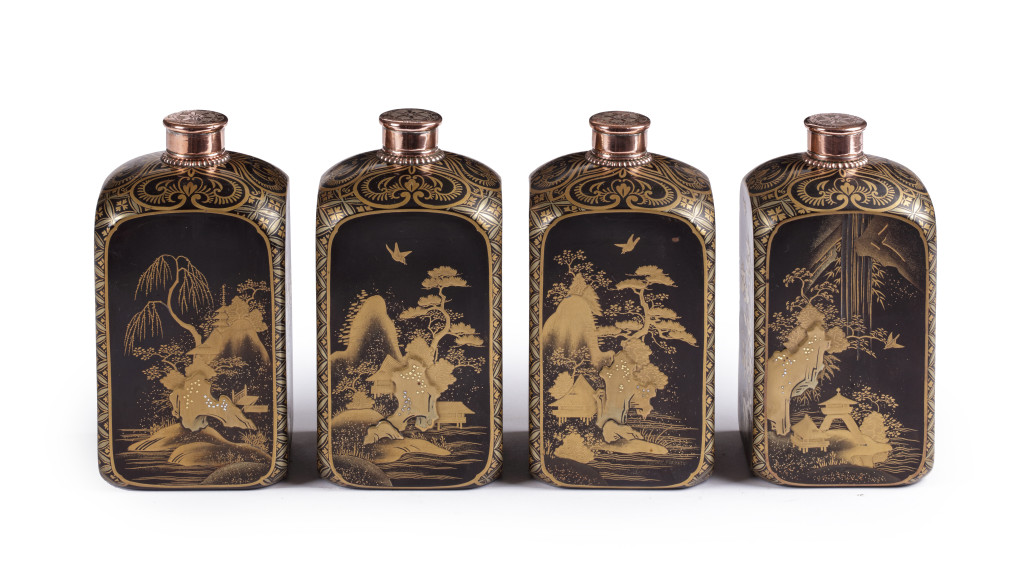 A set of four extremely rare and important pictorial-style Japanese export lacquer bottles
