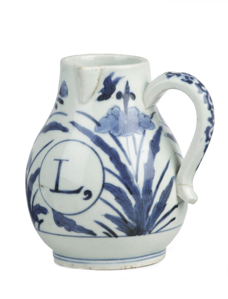 A charming Japanese Arita porcelain 'limoenkannetje' or lemon juice ewer