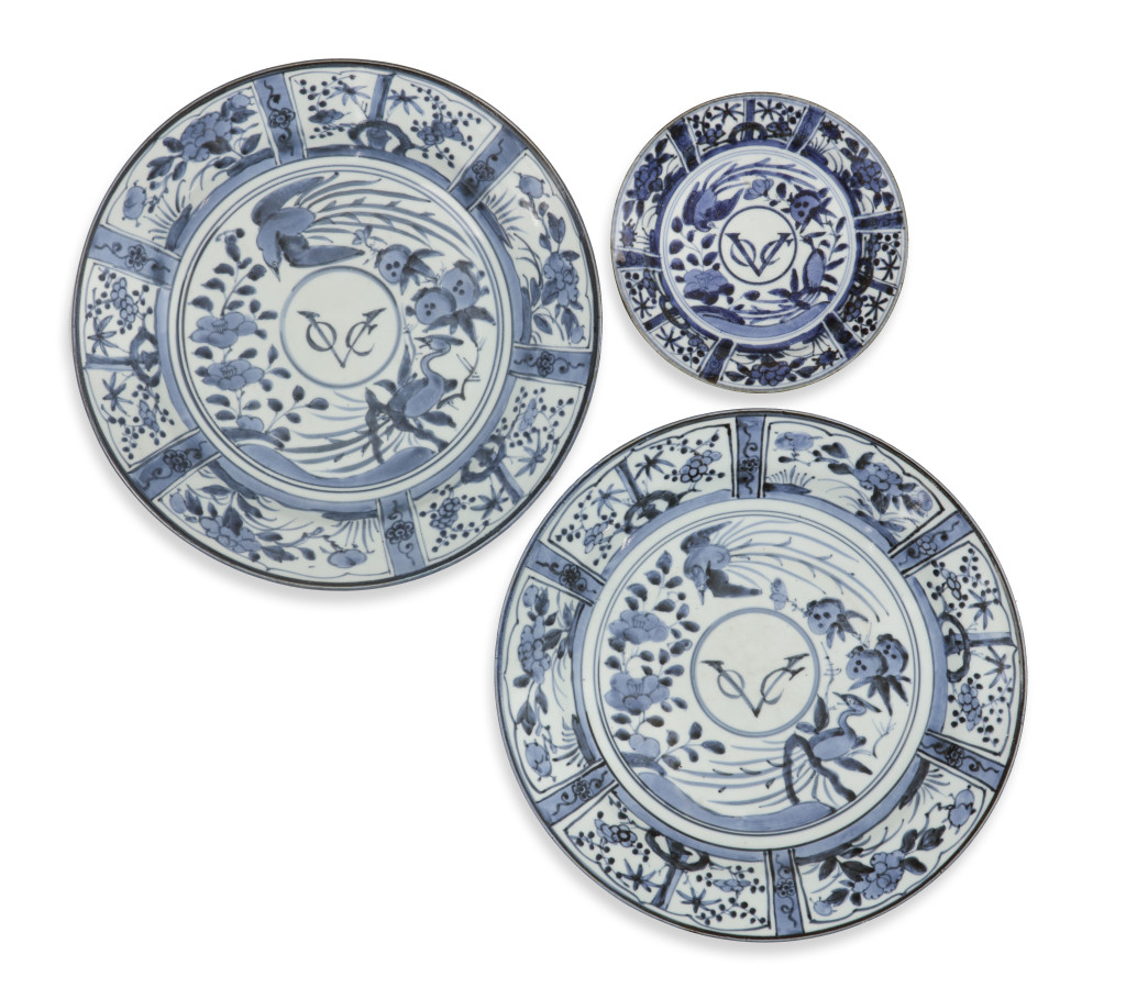 A splendid pair of large Japanese Arita blue and white porcelain VOC chargers and a rare small VOC dish