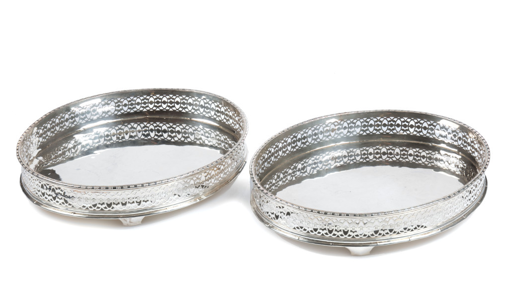 A pair of oval silver trays engraved PB IV, Soerakarta (Paku Buwono IV)