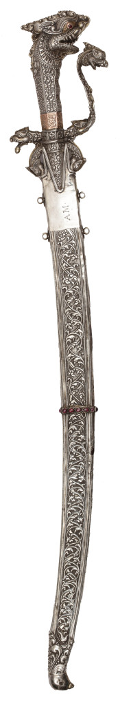 A fine ruby inlaid silver, brass and gold Sinhalese Kasthane