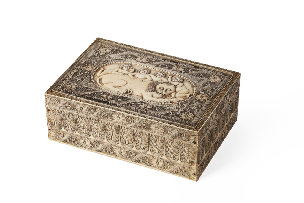An Indian ivory box with a depiction of the myth of the four clever boys and the lion who killed them