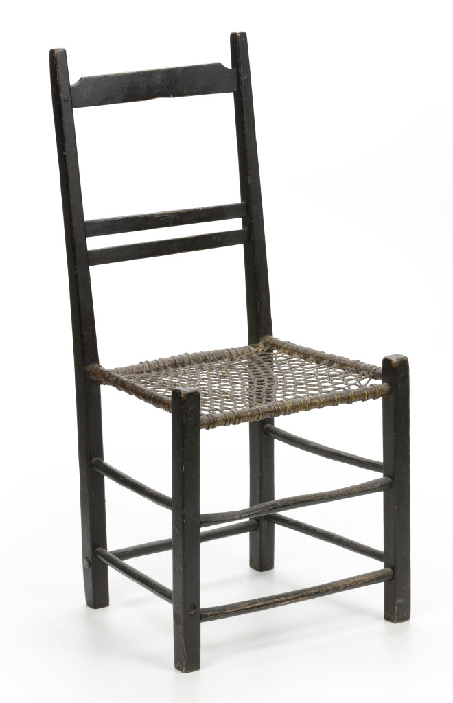 A charming South-African blackened cedarwoord and 'riempie' child's chair