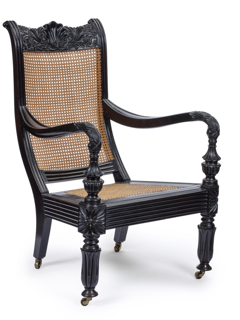 A Sri Lankan ebony and cane 'easy chair’ or 'planter's chair'