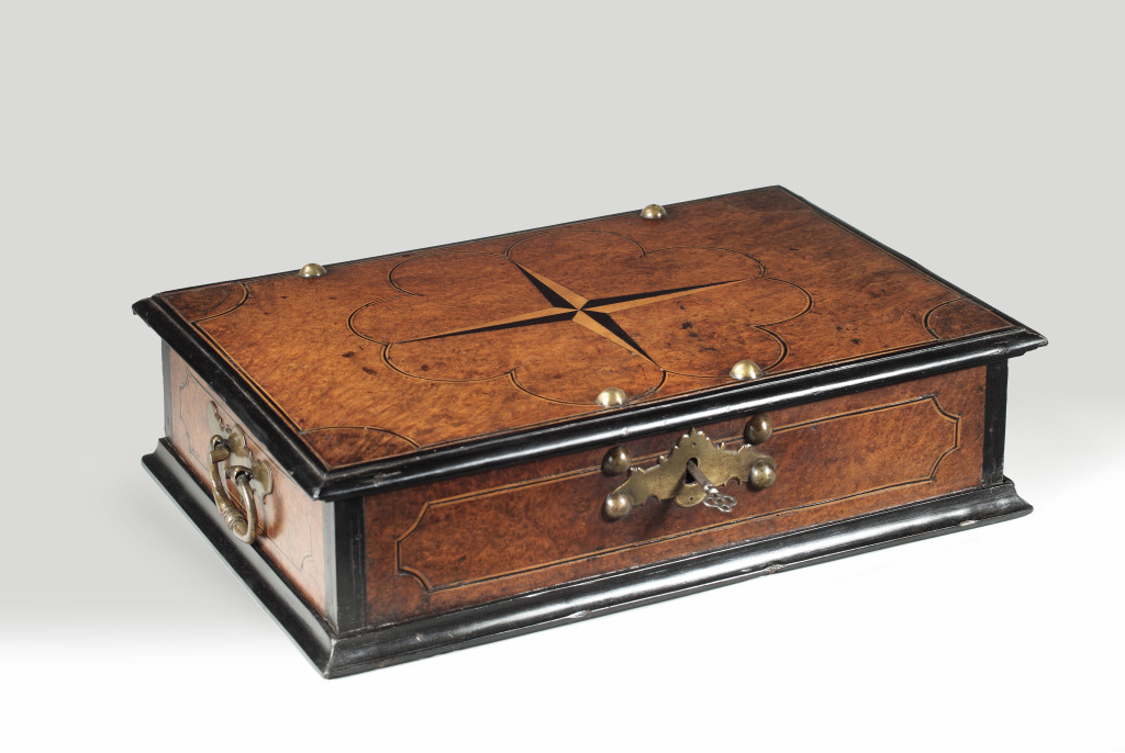 A Sri Lankan ebony and satinwood-inlaid amboyna-burr document chest with brass mounts