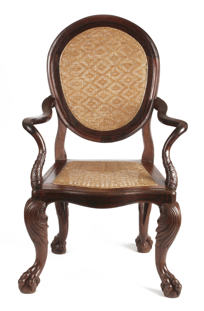 A large Sri Lankan Suriya-Mara or Ceylonese rosewood (Albizia odorotissima) and cane armchair 