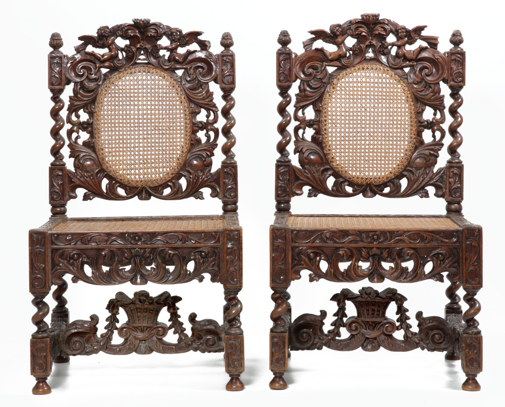 An exceptional pair of baroque Indonesian djati wood chairs