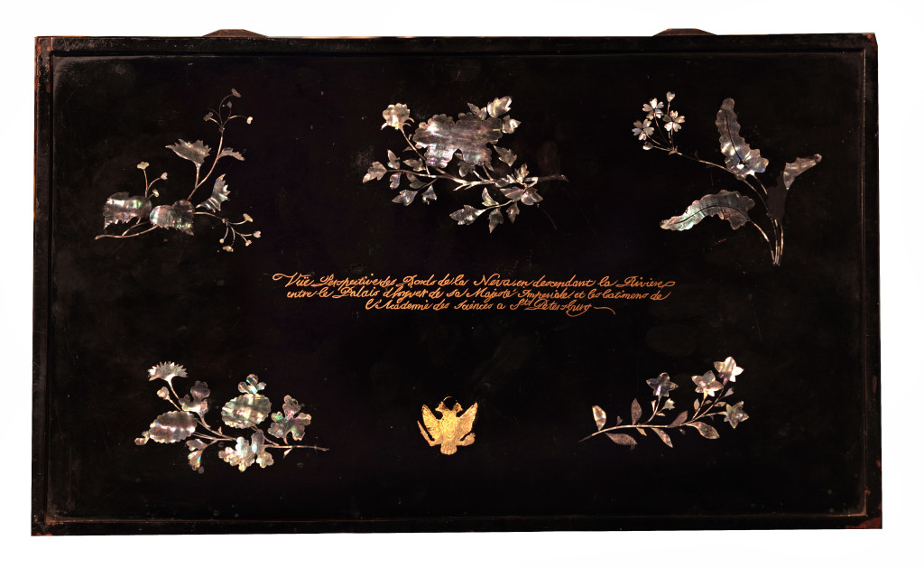 An important Japanese lacquer maki-é panel depicting St. Petersburg on the river Neva with the Winter Palace on the left and the Academy of Science on the right, probably by Lakwerker Sasaya
