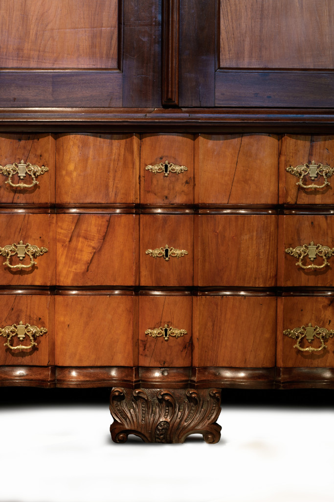 An impressive and important Ambonya, stinkwood and pine Rococo Cape cabinet with Ormolu mounts