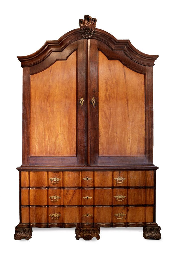 An impressive and important Ambonya, stinkwood and pine Rococo Cape cabinet with Ormolu mounts