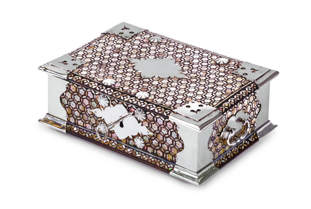 A Dutch colonial Indonesian mother-of-pearl inlaid mastic sirih or betel box with silver mounts