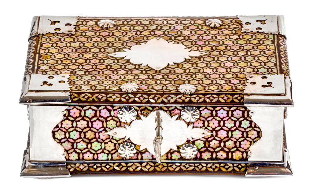 A Dutch colonial Indonesian mother-of-pearl inlaid mastic sirih or betel box with silver mounts