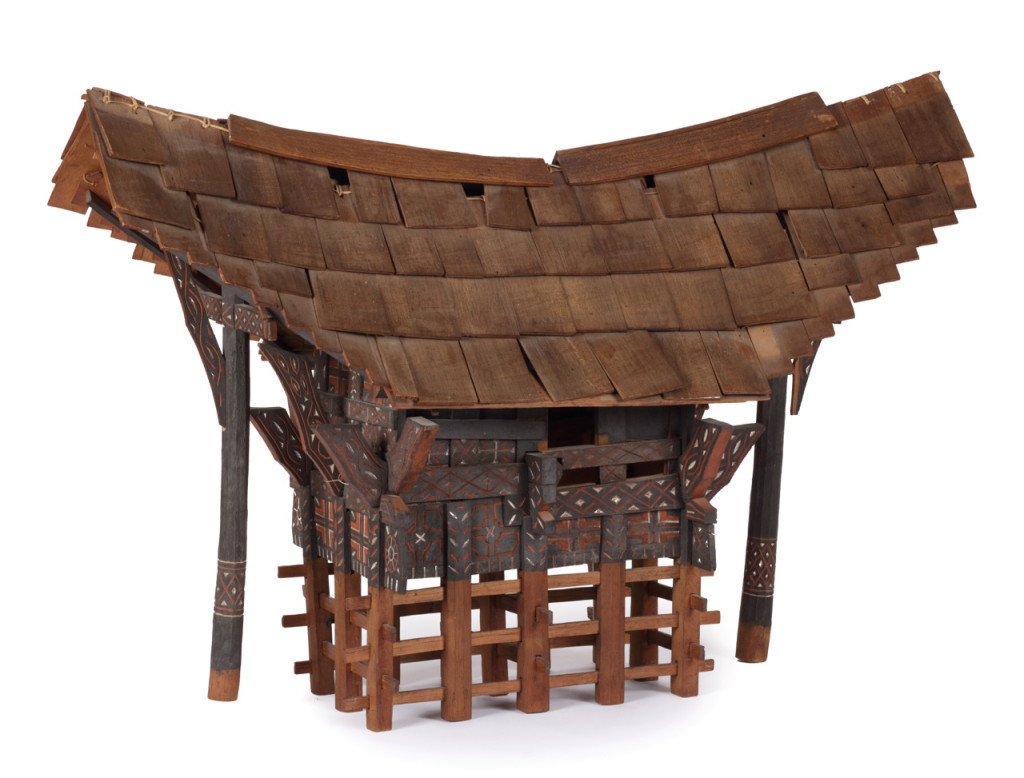 A polychrome wood model of a Toraja dwelling or tongkonan