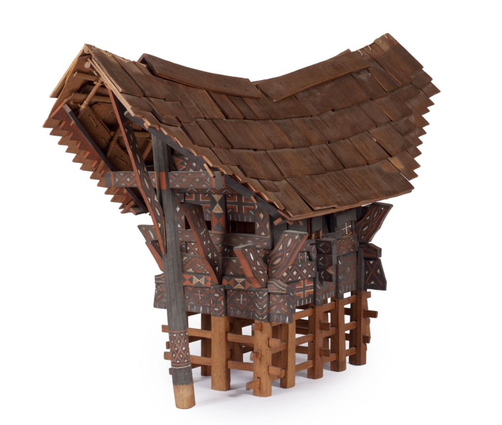 A polychrome wood model of a Toraja dwelling or tongkonan