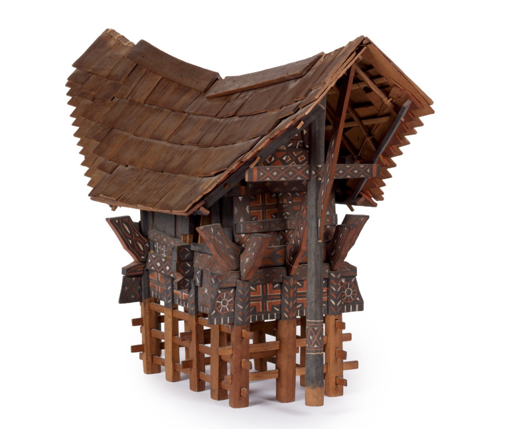 A polychrome wood model of a Toraja dwelling or tongkonan