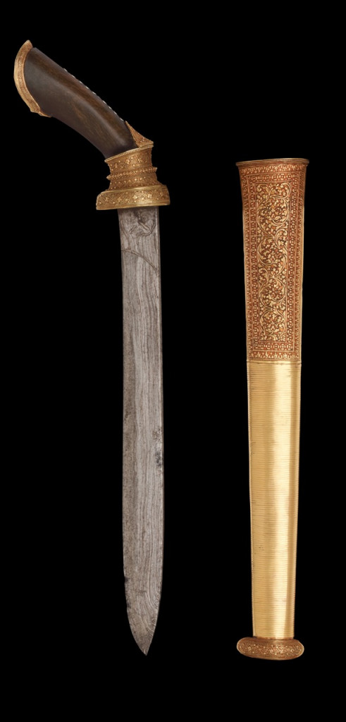 A superb Royal Buginese gold and horn badek dagger