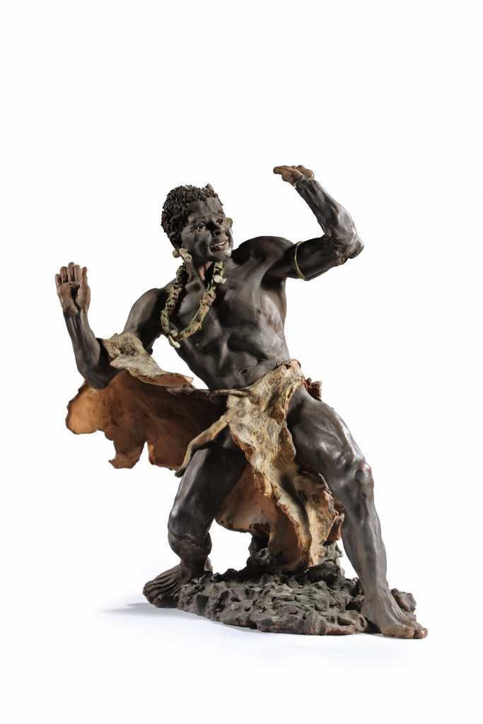 A cold-painted sculpture of a dancing Zulu man