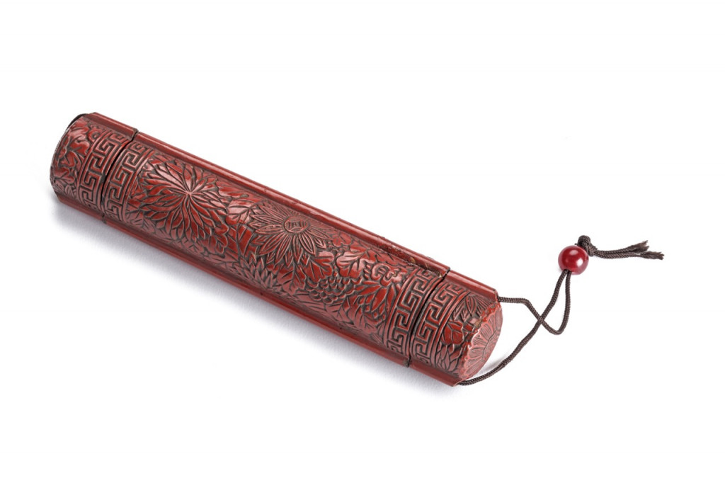 An exceptional Japanese carved red choshitsu lacquer telescope