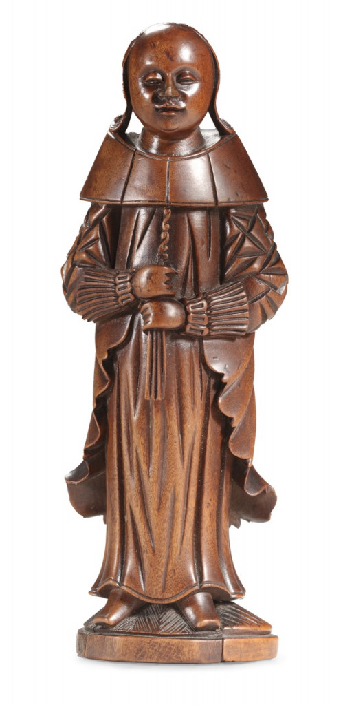 A highly unusual Chinese sandalwood figure of a Dutch lady