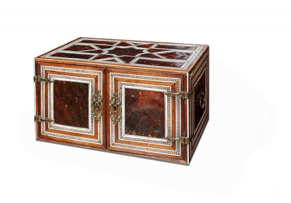 An Indian colonial tortoiseshell and bone veneered teak portable two-door cabinet