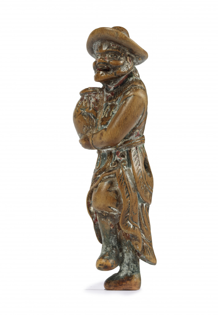 A boxwood Saishiki netsuke of a Dutchman