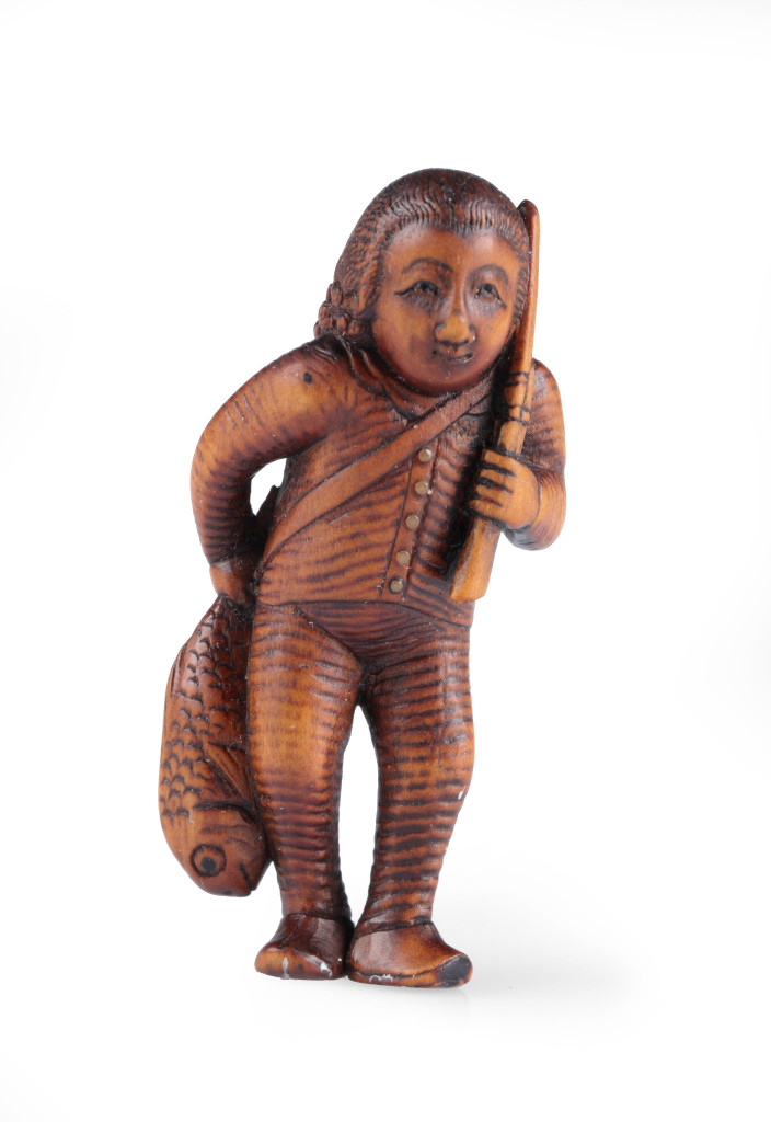 A wood netsuke of a Dutchman by Shunkosai Chogetsu (1826-1892)