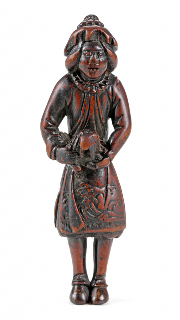 A boxwood netsuke of a Dutchman