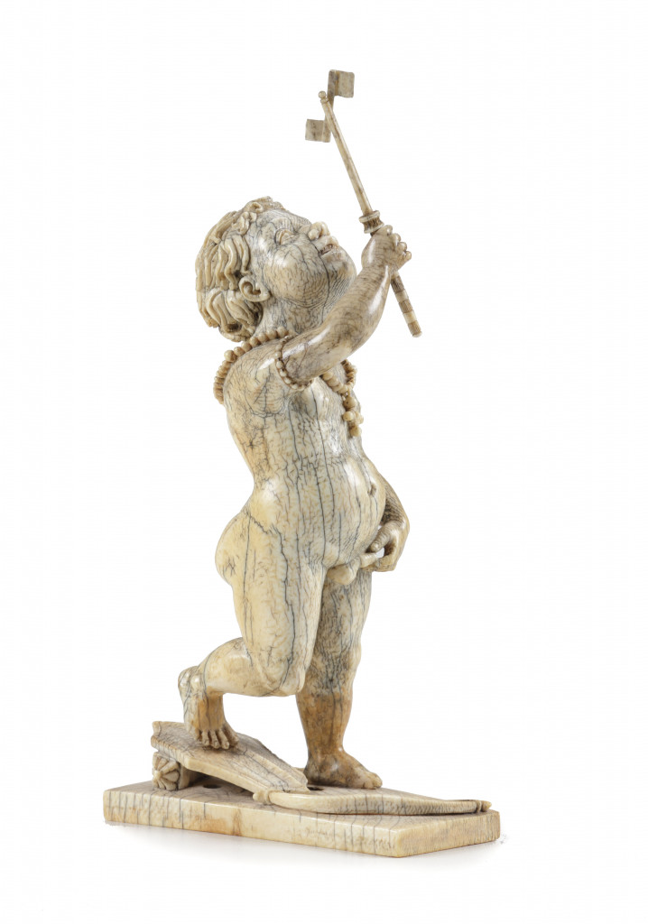A mammoth ivory figure of an African Amor